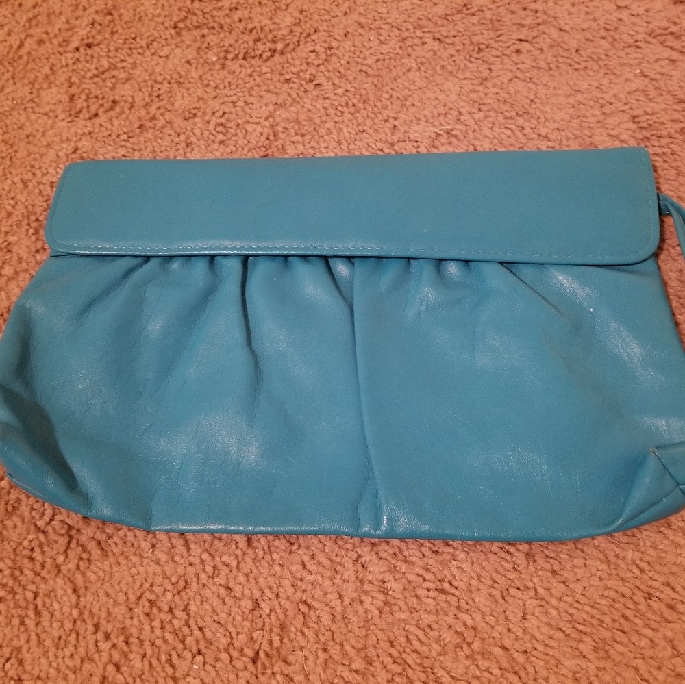 Blue vintage clutch with white lining